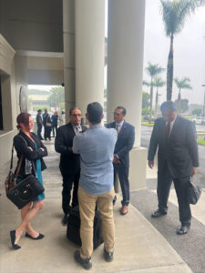 Ian and Shawn Schweitzer’s legal team outside the courthouse.