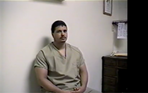 Michael Ortiz in May of 1999 being interviewed by Police.